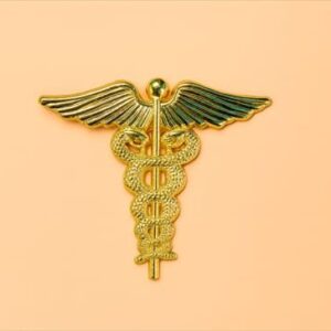 broche caduceo símbolo medicina