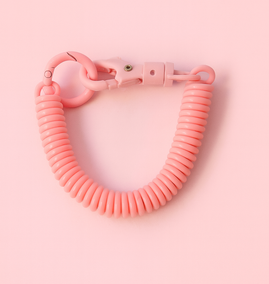 llavero tipo resorte rosado claro